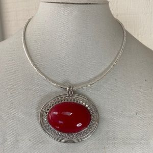 Large silvertone and red medallion necklace
